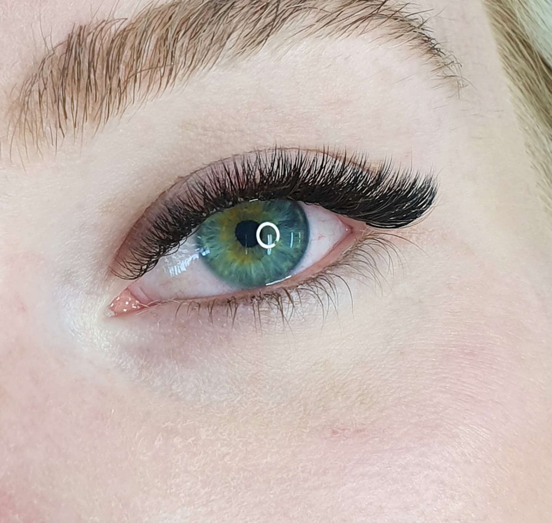 Beautiful lash extensions and green eyes